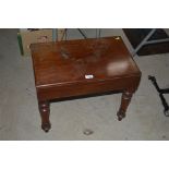 A Victorian mahogany bidet, complete with liner