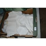 A box of various vintage table linen