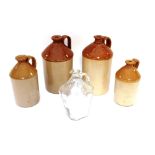 Four stone glazed jars and a glass flagon