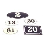 Five assorted enamel house numbers