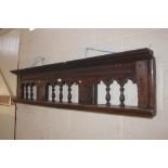 An antique carved overmantel