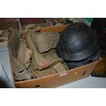 A box containing various World War II army items