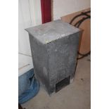 An old galvanised coal bunker