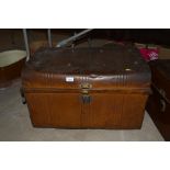 A japanned metal travelling trunk