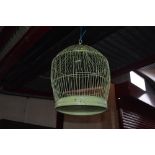 A metal vintage bird cage