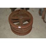Four old cast iron rib roll rings