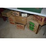 A collection of various vintage cardboard advertis