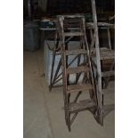 A set of five vintage five tread steps with top pl