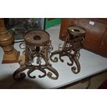 A pair of early iron candle stands