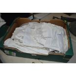 A box of various vintage table linen etc.