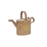 An old brass watering can