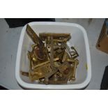 A quantity of brass door handles