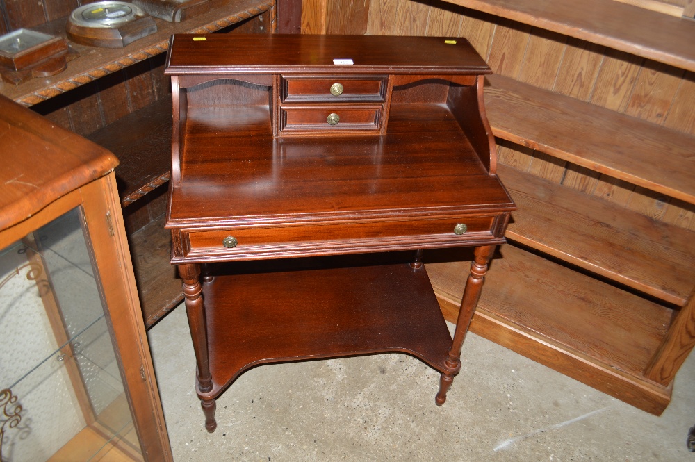 A reproduction mahogany ladies desk