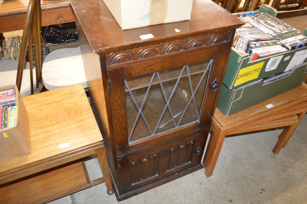 An Old Charm oak and leaded glazed hi-fi cabinet