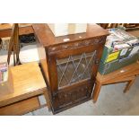 An Old Charm oak and leaded glazed hi-fi cabinet