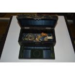 A Victorian leather bound jewellery box containing