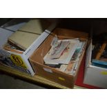 A box of British and World stamps in packets, cove