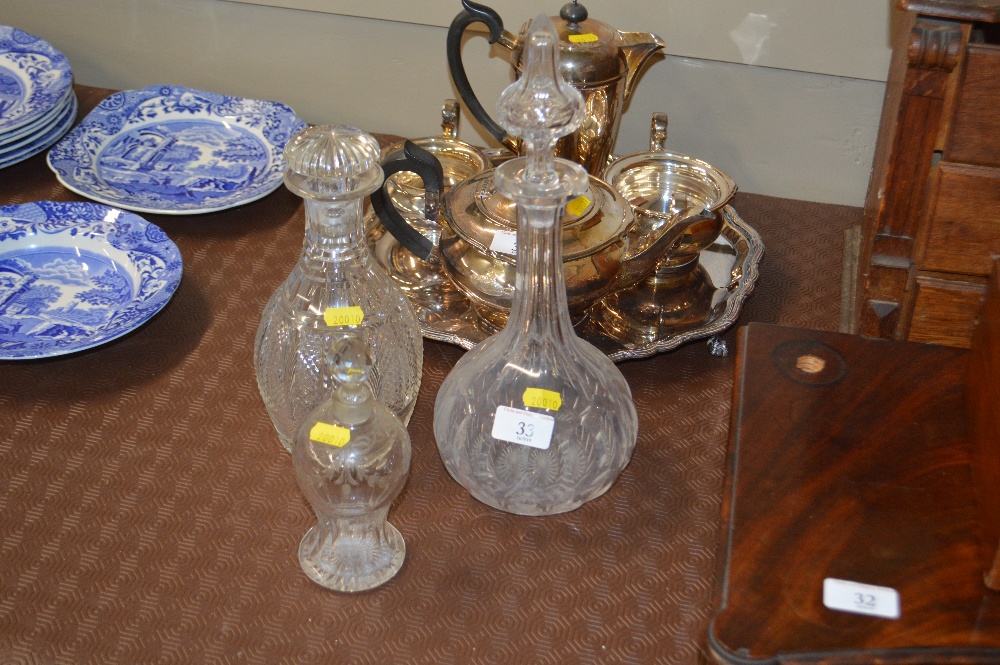 Two 19th Century glass decanters; and a small glas