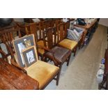 A set of eight mahogany rail back dining chairs to