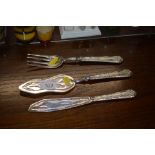 A white metal three piece fruit serving set (the h