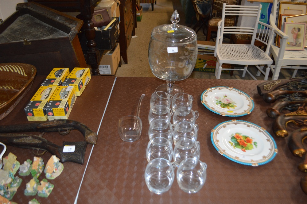 An etched glass pedestal punch bowl, with a set of