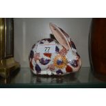 An Imari patterned rabbit ornament