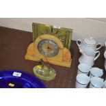 Two Art Deco mantel clocks and an onyx ash tray