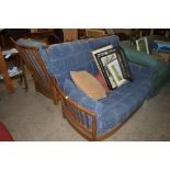 An Ercol Renaissance two seater settee and matchin