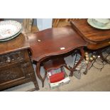 A painted two tier wall shelf; and a mahogany tabl