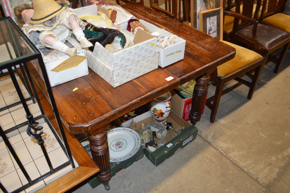 A Victorian square topped dining table