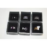 Four 10kt gold plated dress rings