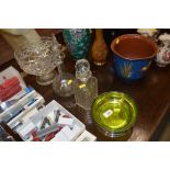 A glass pedestal bowl; two decanters and a silver