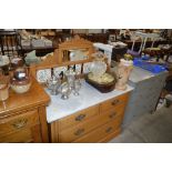 A late Victorian marble topped washstand fitted tw