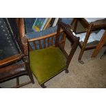 A late Victorian green upholstered nursing chair