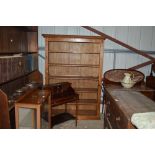 A large stripped pine bookcase