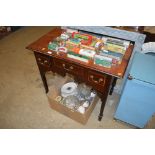 An Edwardian mahogany and inlaid three drawer low