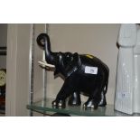 A large carved ebony elephant