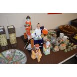 A collection of Hakata dolls and figures, includin