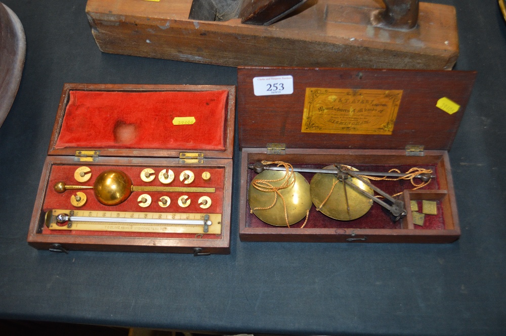 A mahogany cased Sikes hydrometer; and a set of 19