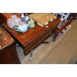 A 19th Century mahogany drop leaf supper table