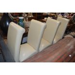 A set off our cream faux leather dining chairs