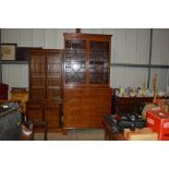 A George III mahogany and inlaid secretaire bookca