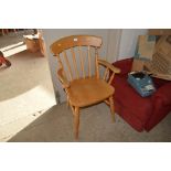 A beech slat back elbow chair