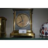 A brass cased clock