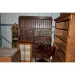 A large oak open fronted bookcase