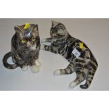 Two pottery Winstanley style cats with glass eyes