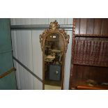 A gilt framed oblong mirror