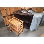 A corner bookcase; and a pine three tier rack