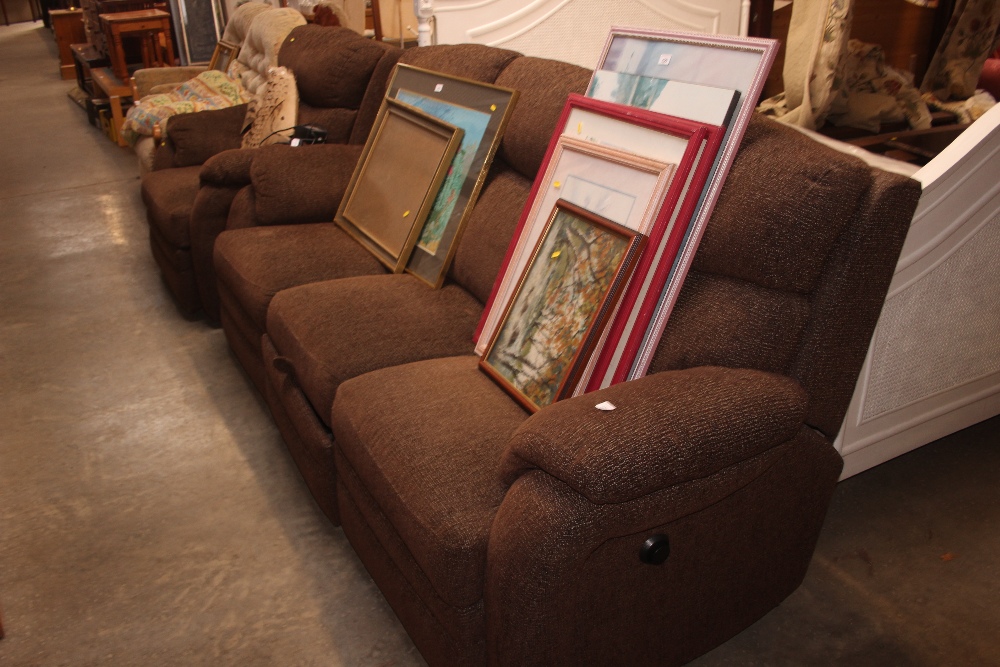 A two piece suite comprising of a three seater rec