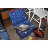 A plastic tool box and contents
